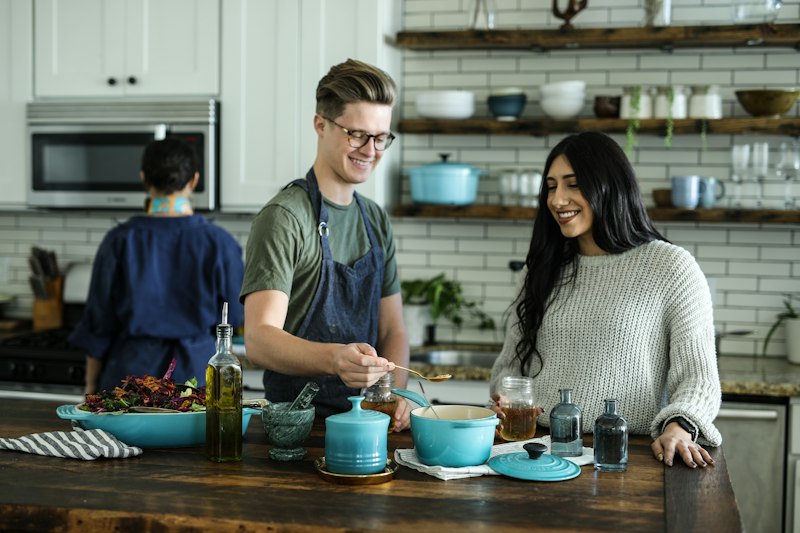 Community cooking in kitchen
